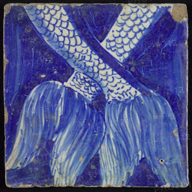 Tile of chimney pilaster, blue on white, part of column, end piece of winding scaly tails, chimney pilaster tile pilaster