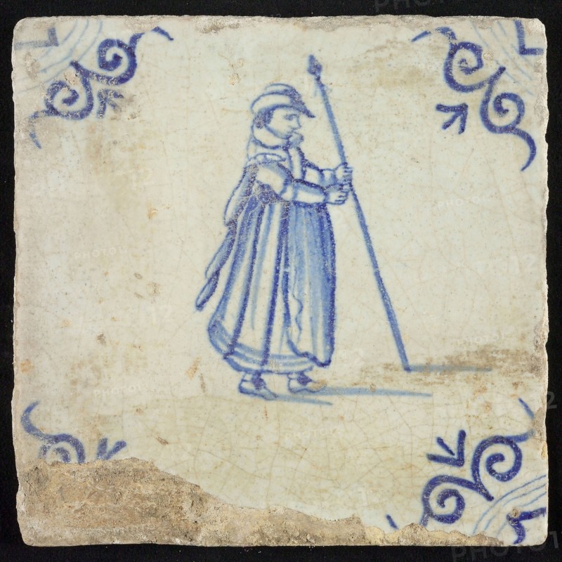 Figure tile, standing monk with lance, corner motif oxen head, wall tile tile sculpture ceramic earthenware glaze, baked 2x