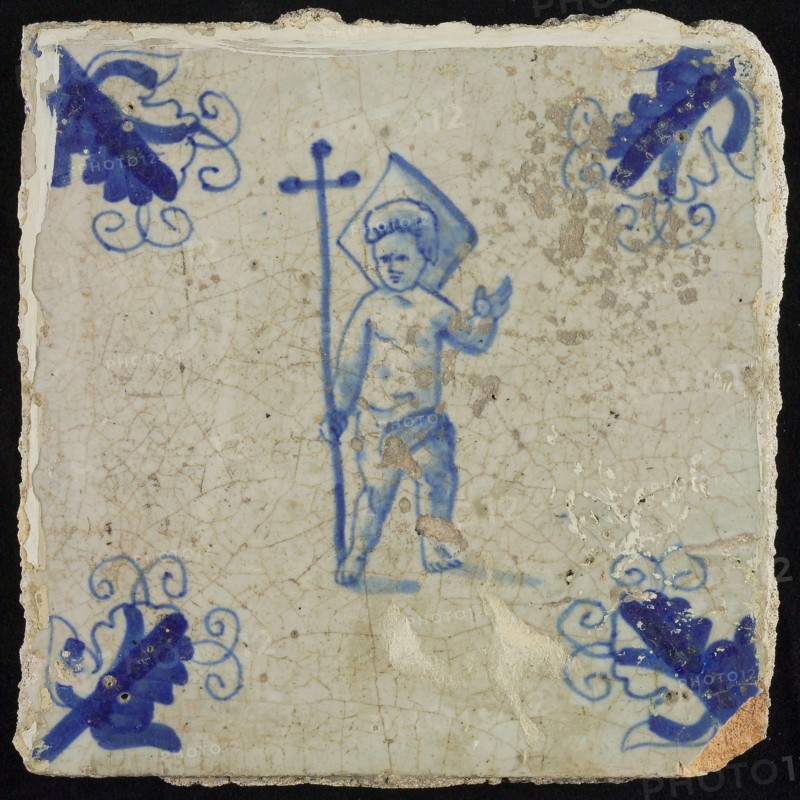 Figure tile, standing Christ child with staff on which cross, corner motif, creeper, wall tile tile sculpture ceramic