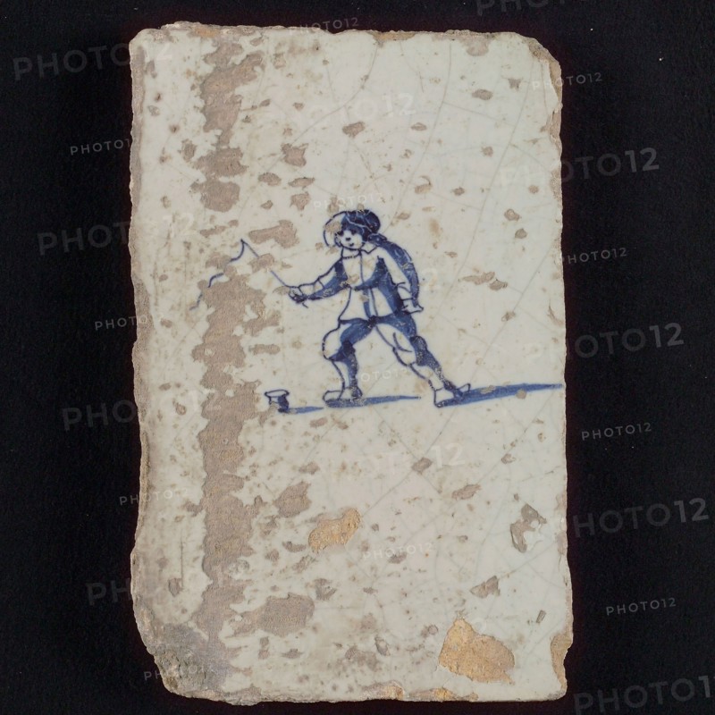 Scene tile, child's play, spinning, wall tile tile sculpture ceramic earthenware glaze, baked 2x glazed painted Blue on white