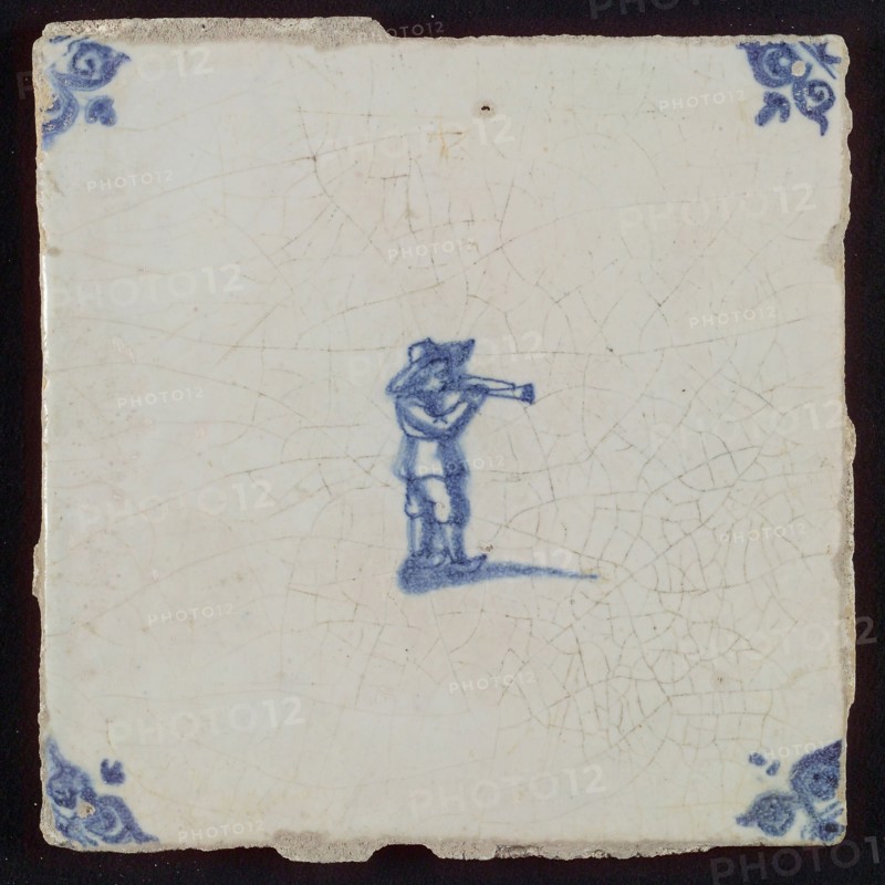 Scene tile, child's play, making music, trumpet, corner motif ox's head, wall tile tile sculpture ceramics pottery glaze tin