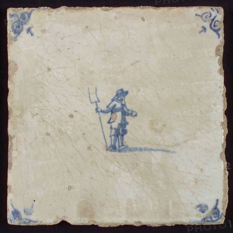 Figure tile, man with pitchfork, corner motif ox's head, wall tile tile sculpture ceramic earthenware glaze, baked 2x glazed