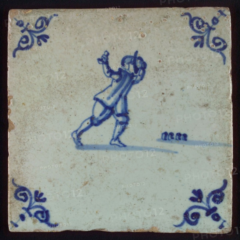 Scene tile, child's play, koot, corner motif ox's head, wall tile tile sculpture ceramic earthenware glaze, baked 2x glazed