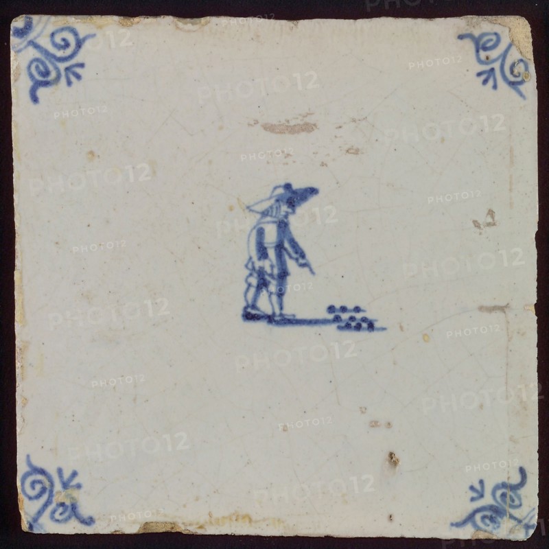 Scene tile, child's play, koot, corner motif ox's head, wall tile tile sculpture ceramic earthenware glaze, baked 2x glazed