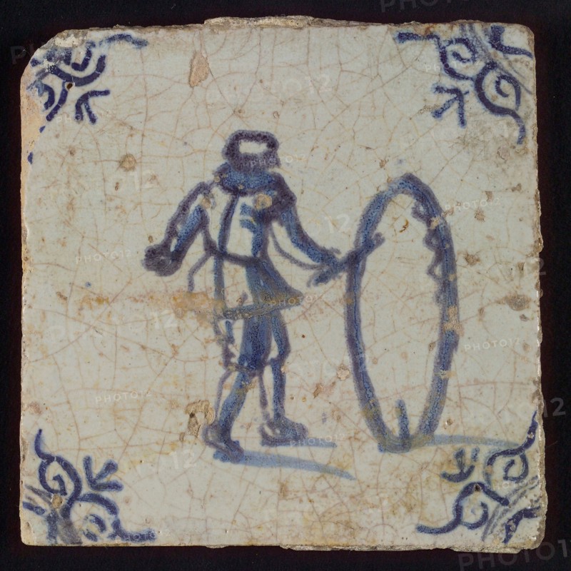 Scene tile, child's play, child with hoop, corner motif ox's head, wall tile tile sculpture ceramic earthenware glaze, baked 2x