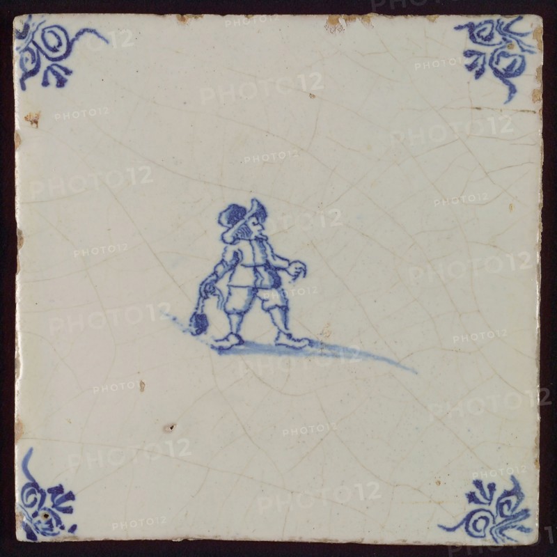 Scene tile, child's play, child with boulder, corner pattern ox's head, wall tile tile sculpture ceramic earthenware glaze