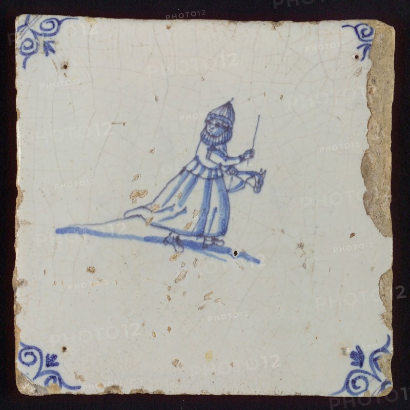 Scene tile, child's play, hobbyhorse, corner motif ox's head, wall tile tile sculpture ceramic earthenware glaze tin glaze