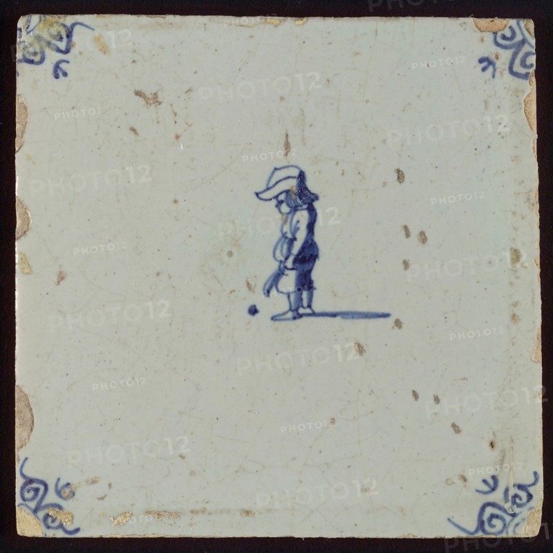 Scene tile, child's play, child with ball, corner motif ox's head, wall tile tile sculpture ceramic earthenware glaze, baked 2x