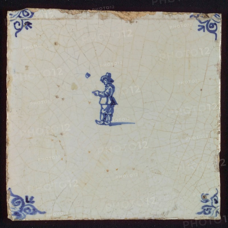 Scene tile, child's play, child with ball, corner pattern ox's head, wall tile tile sculpture ceramic earthenware glaze, baked