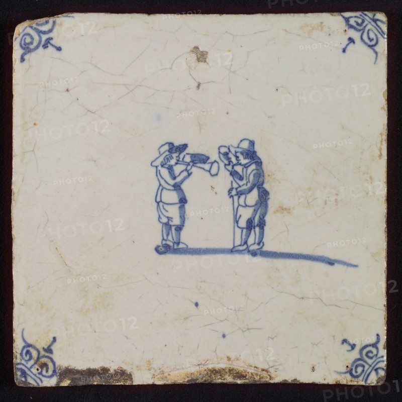 Scene tile, child's play, trumpet and horn playing, corner motif ox's head, wall tile tile sculpture ceramic earthenware enamel