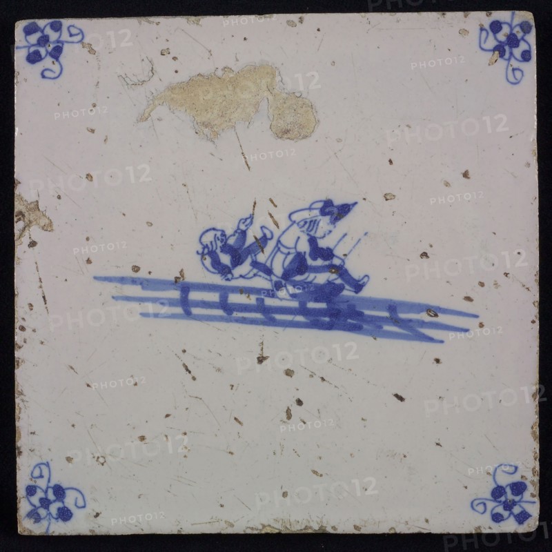 Scene tile, double child's play, sledging, corner motif spider, wall tile tile sculpture ceramic earthenware glaze, baked 2x