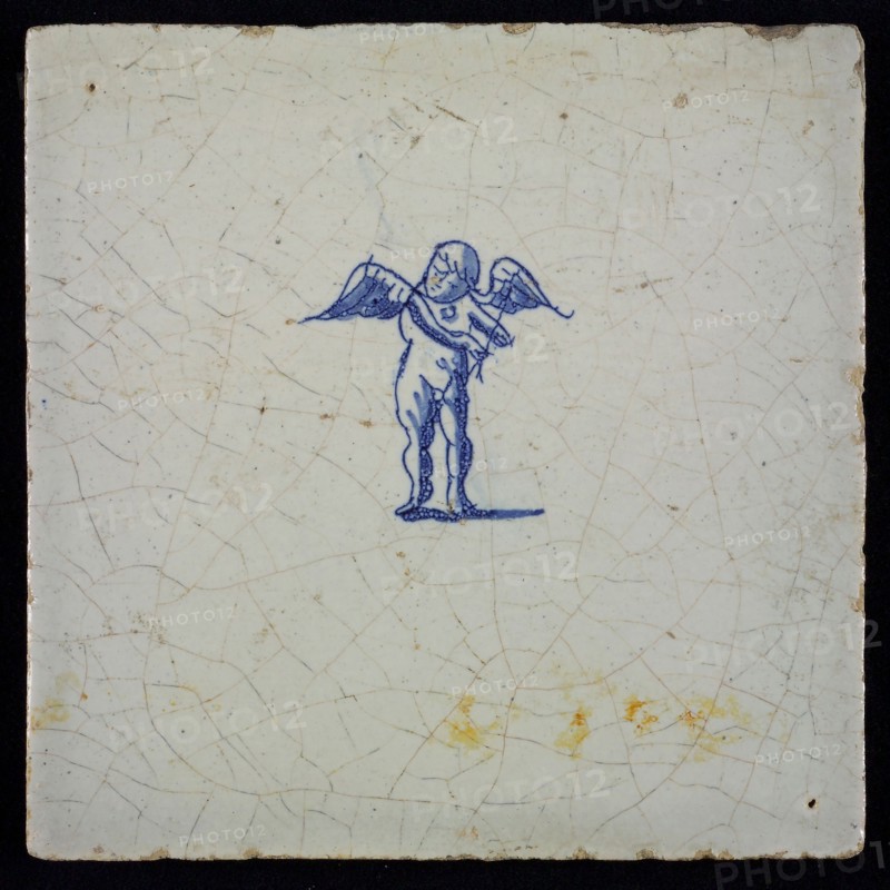 White tile with blue putto, wall tile tile sculpture ceramic earthenware glaze, baked 2x glazed painted