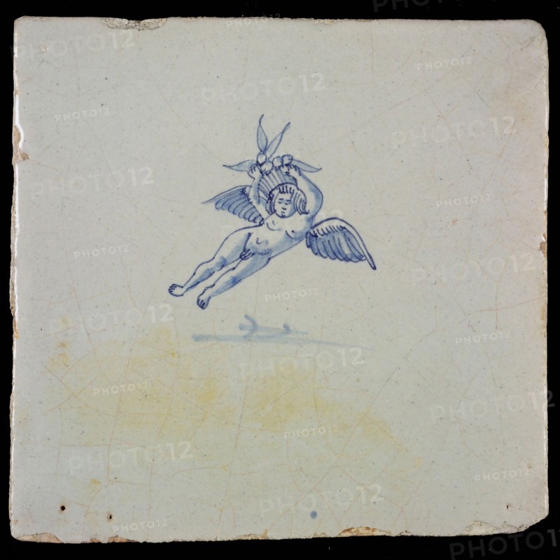 White tile with blue flying putto, wall tile tile sculpture ceramic earthenware glaze, baked 2x glazed painted
