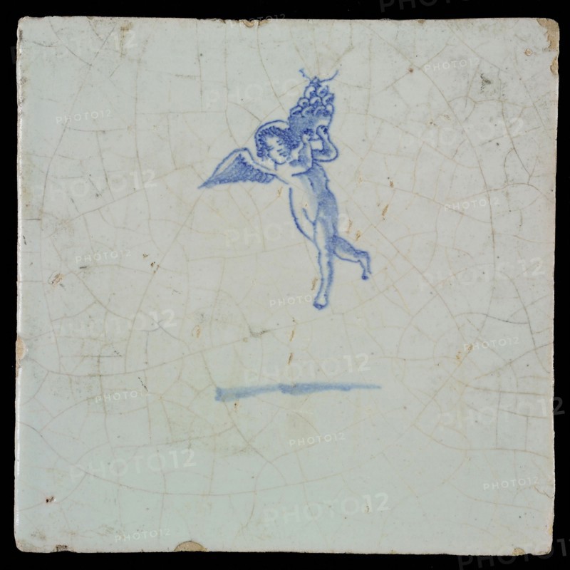 White tile with blue flying putto, wall tile tile sculpture ceramic earthenware glaze, baked 2x glazed painted