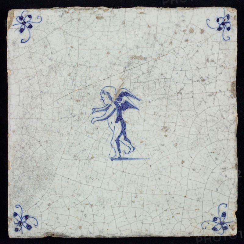 White tile with blue putto; corner motif spider, wall tile tile sculpture ceramic earthenware glaze, baked 2x glazed painted