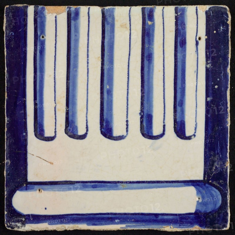 Tile of chimney pilaster, blue on white, part of column with cannelure and basement, chimney pilaster tile pilaster footage