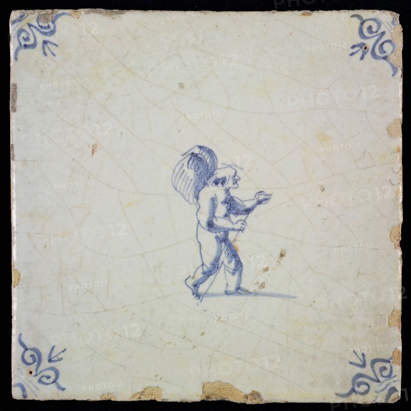 White tile with blue putto; corner pattern ox head, wall tile tile sculpture ceramic earthenware glaze, baked 2x glazed painted