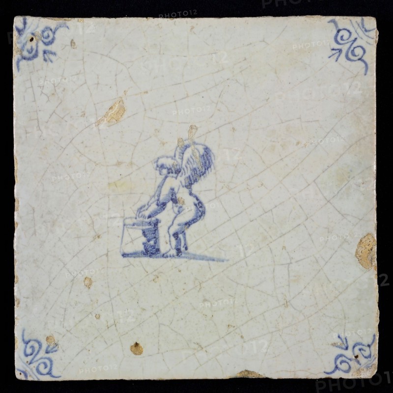 White tile with blue putto; corner pattern ox head, wall tile tile sculpture ceramic earthenware glaze, baked 2x glazed painted