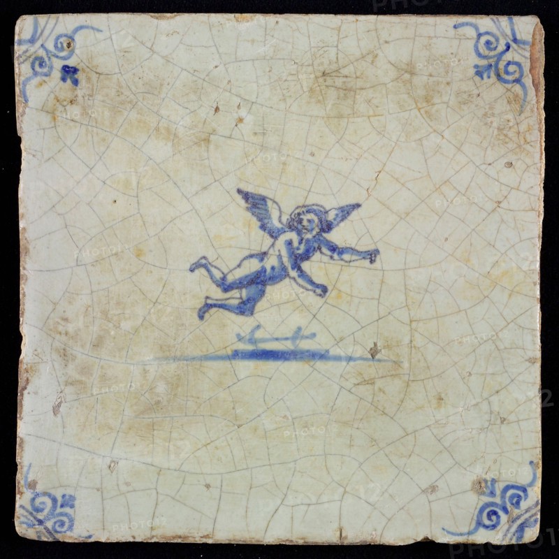 White tile with blue flying putto; corner pattern ox head, wall tile tile sculpture ceramic earthenware glaze, baked 2x glazed