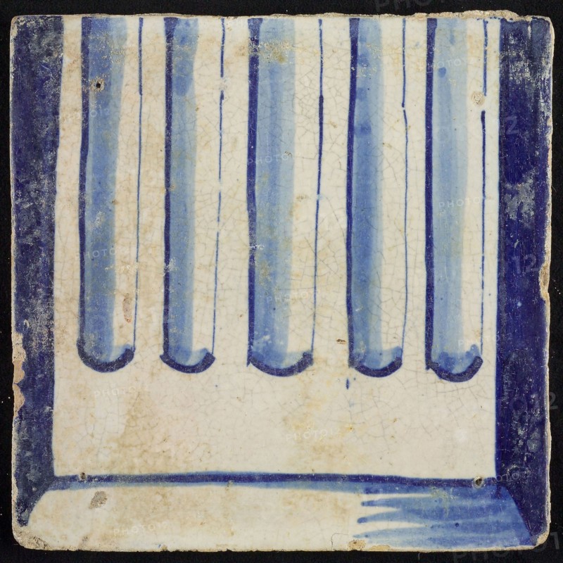 Tile of chimney pilaster, blue on white, part of column with cannelure and basement, chimney pilaster tile pilaster footage