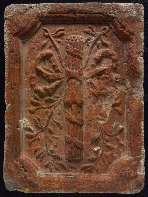 Hearthstone, from Antwerp Belgium, with bound reed bundle with heart, hearth fireplace component ceramics brick, baked Hearth