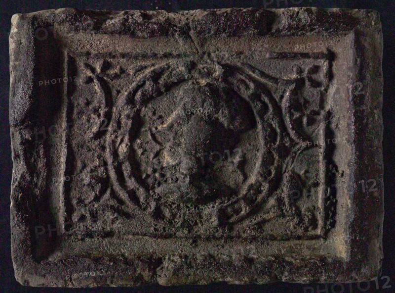 Hearthstone, Luiks, from Luik, Liege Belgium, with wide frame, with male or female head, hearth fireplace component ceramics