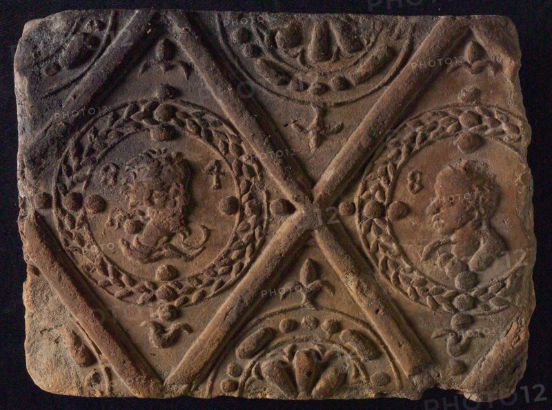 Hearthstone, from Antwerp Belgium, without frame, with male and female head, hearth fireplace component ceramics brick, flamed