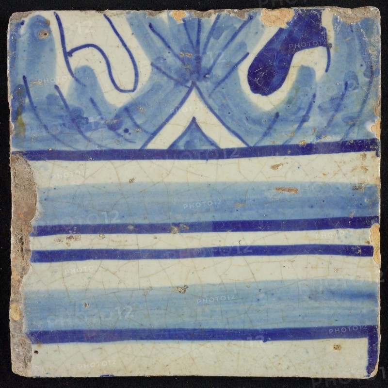 Tile of chimney pilaster, blue on white, part of column with capital, chimney pilaster tile pilaster footage fragment ceramic
