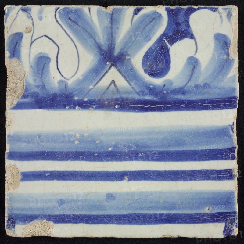 Tile of chimney pilaster, blue on white, part of column with capital, chimney pilaster tile pilaster footage fragment ceramic