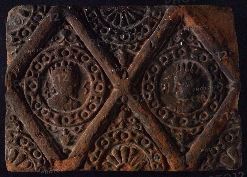 Hearthstone, from Antwerp Belgium, without frame, with male and female head, fireplace stone part ceramic brick, baked Hearth