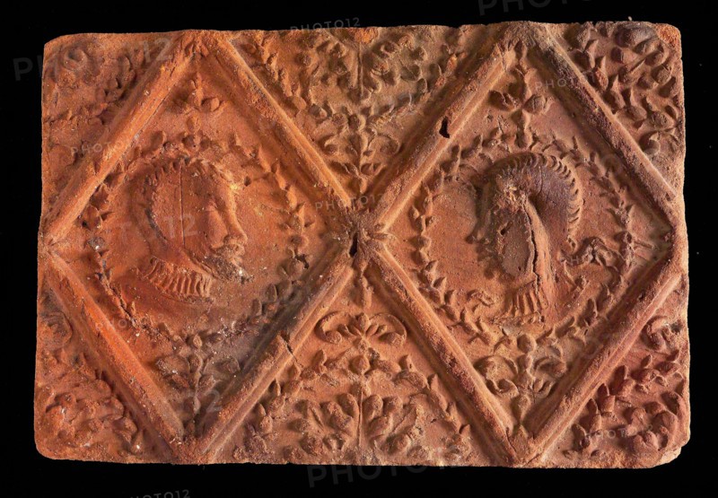 Hearthstone, from Antwerp Belgium, without frame, with male and female head, fireplace hearth part ceramic bricks, fired Hearth
