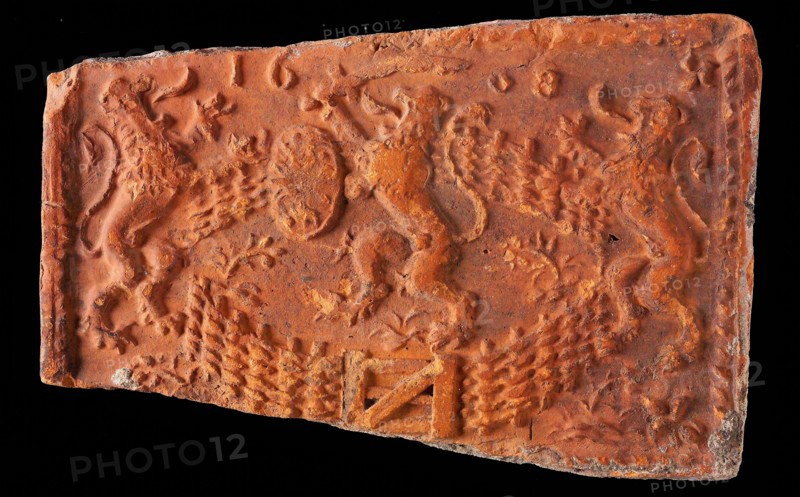 Hearthstone, from Antwerp Belgium, with narrow frame, with lion in Dutch garden, fire stone fireplace component ceramics brick