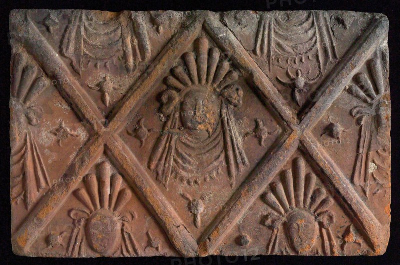 Hearthstone, from Antwerp Belgium, without frame, with mascaron on the window, hearth fireplace component ceramics brick, baked