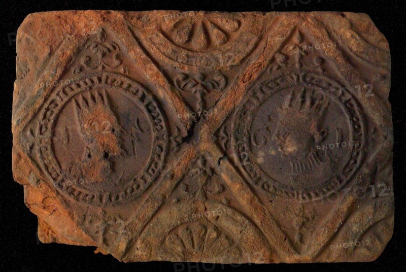 Hearthstone, from Antwerp Belgium, without frame, with crowned male and female head, fireplace hearth part ceramics brick, baked
