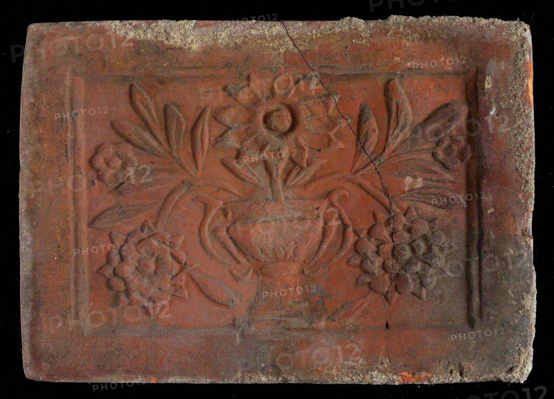 Hearthstone, Luiks, from Luik, Liege Belgium, with wide frame, vase with flowers, hearth stone fireplace part ceramic brick