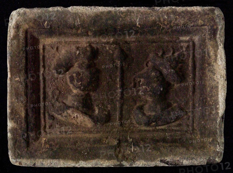Hearthstone, Luiks, from Luik, Liege Belgium, with wide frame, with male and female head, hearth fireplace part ceramic brick