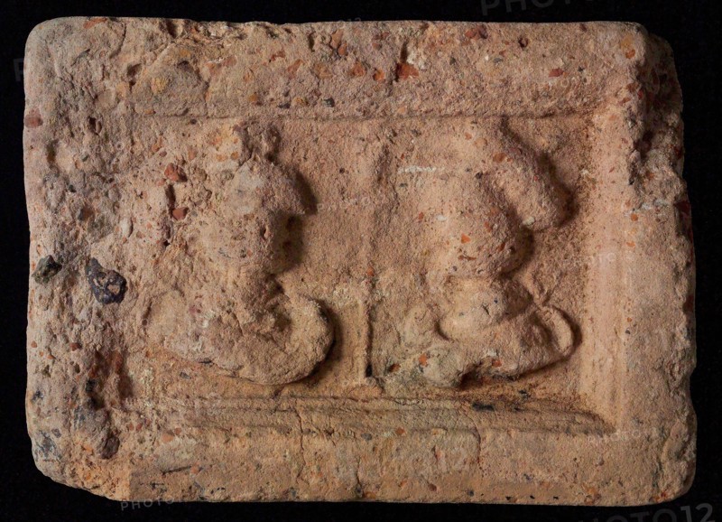 Hearthstone, Luiks, from Luik, Liege Belgium, with wide frame, with male and female head, fireplace hearth part ceramic brick