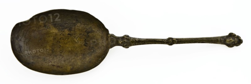 Brass spoon with oval bowl, engraved floral motifs, carved stem with male head, spoon cutlery soil find copper metal, poured