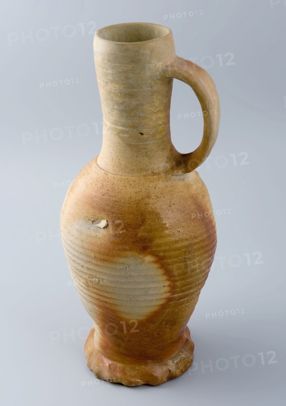 High stoneware jug, gray glazed with brown spots, on squeeze foot, jug crockery holder soil find ceramic stoneware glaze salt