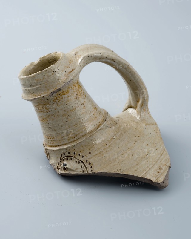 Neck fragment of stoneware jug with pointed nose on the shoulder, Bartmann jug, also called Bellarmine jug, beard masonry vessel