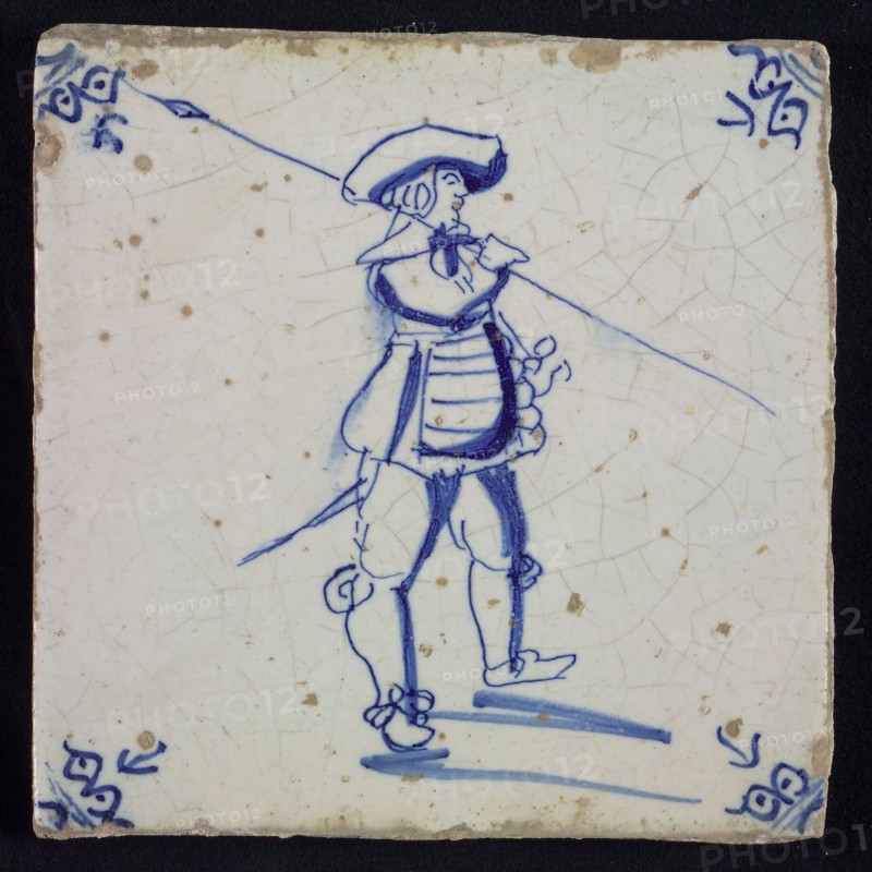 White tile with blue warrior; corner pattern ox head, wall tile tile sculpture ceramic earthenware glaze, baked 2x glazed