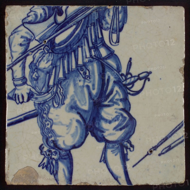 Tile of tableau with in blue torso of soldier, tile picture footage fragment ceramics pottery glaze, baked 2x glazed painted