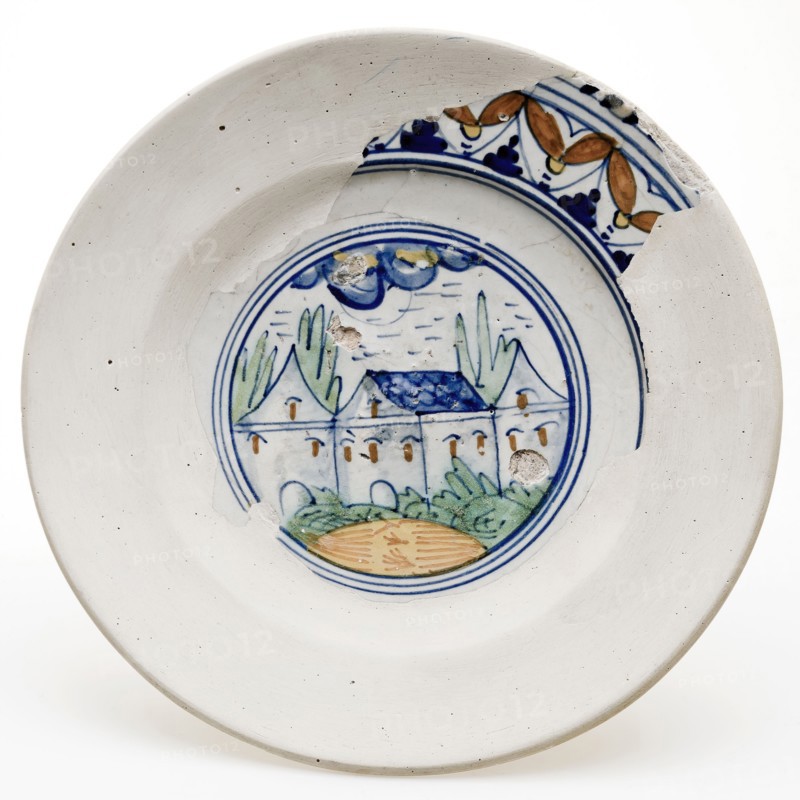 Completed majolica sign with polychrome landscape with buildings and trees, plate crockery holder soil find ceramic earthenware
