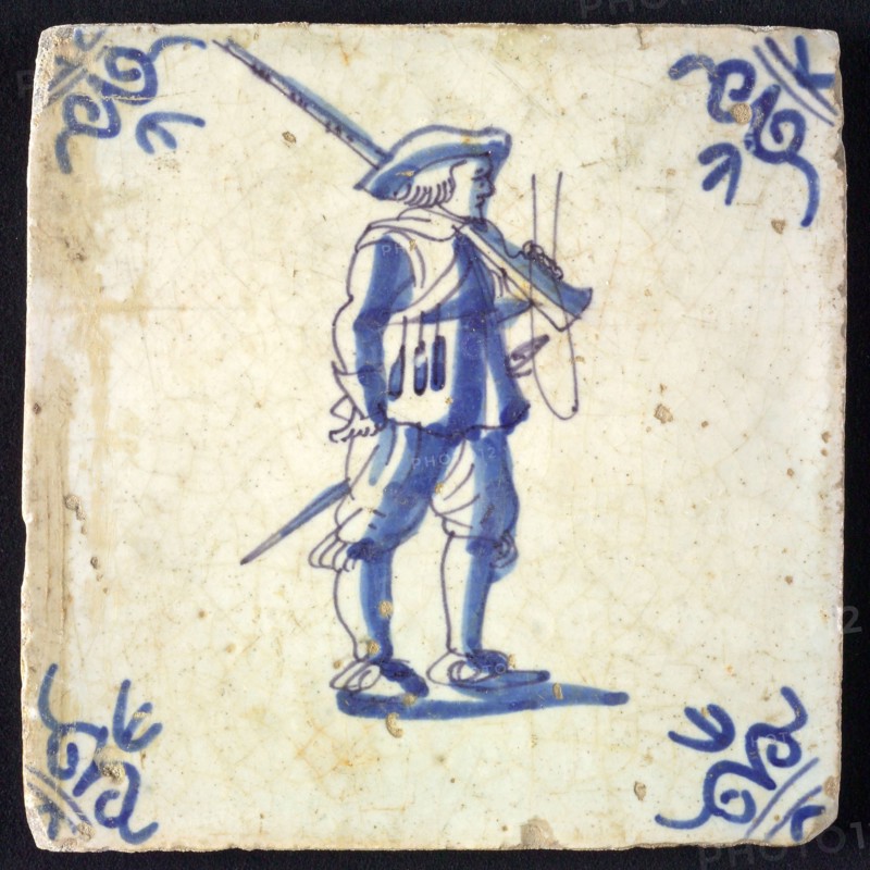 White tile with blue warrior; corner pattern ox head, wall tile tile sculpture ceramic earthenware glaze, baked 2x glazed
