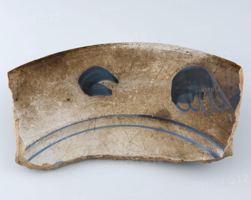 Border fragment of majolica dish decorated with monochrome decor, misbaksel, dish tableware holder fragment earthenware pottery