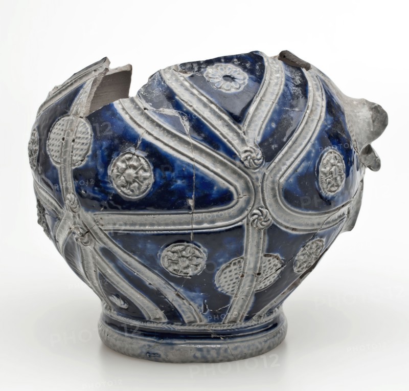 Fragment of Westerwald jug, rounded ball with swaying grooves over the belly and appliqués, jug crockery holder soil find