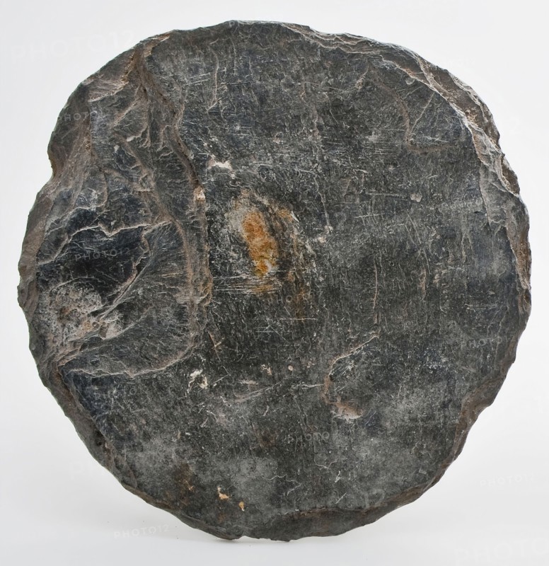 Almost circular slate, uneven surface, slate soil found slate stone, cutted Round cut disc arch archeology Valckensteyn