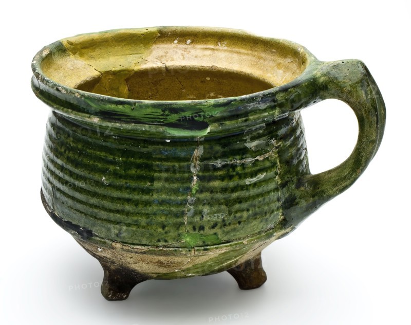 Green cooking pot, cooking jug on legs with pinched standing ear, pouring lip, cooking pot crockery holder utensils earthenware