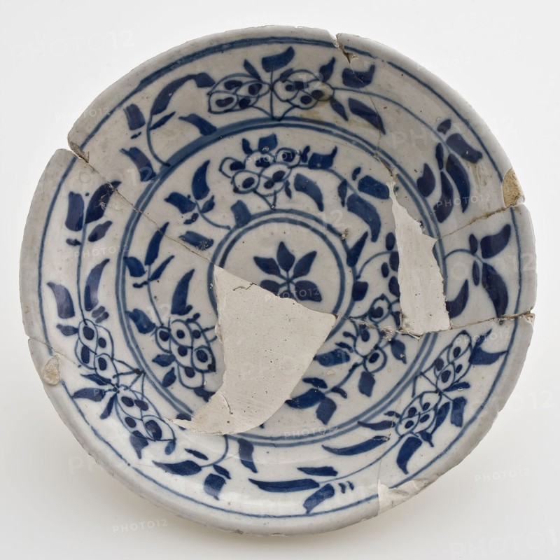 Small faience dish on stand with blue floral decor inside circles, dish plate tableware holder soil find ceramic earthenware