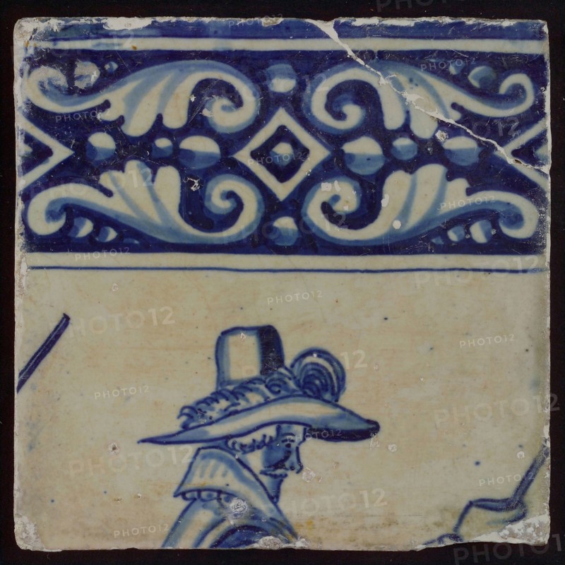 Tile of tableau with decorated rim, male head with hat, tile picture footage fragment ceramics pottery glaze, baked 2x glazed